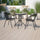 23.75'' Round Glass Metal Table with 2 Black Rattan Stack Chairs - Flash Furniture