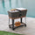 80-Quart Wood Grain Metal Rolling Ice Chest Cooler Cart with Storage Shelf - Sunjoy