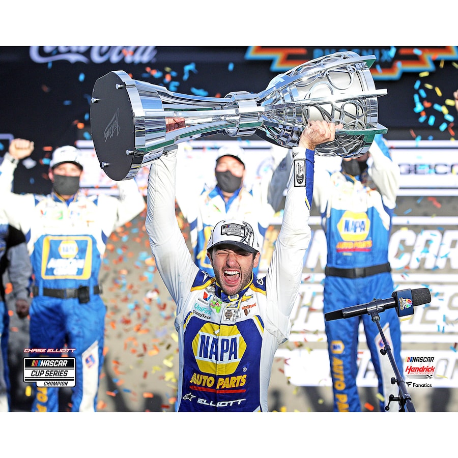 Chase Elliott Unsigned 2020 NASCAR Cup Champion Holding Trophy Above Head Photograph