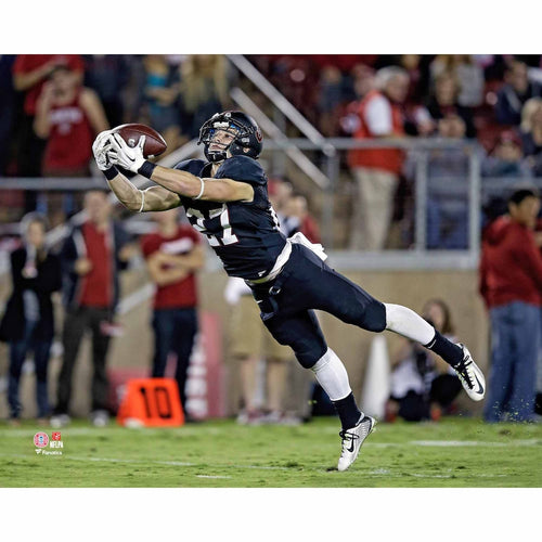 Christian McCaffrey Stanford Cardinal Unsigned Black Jersey Diving for Catch vs. Washington State Photograph