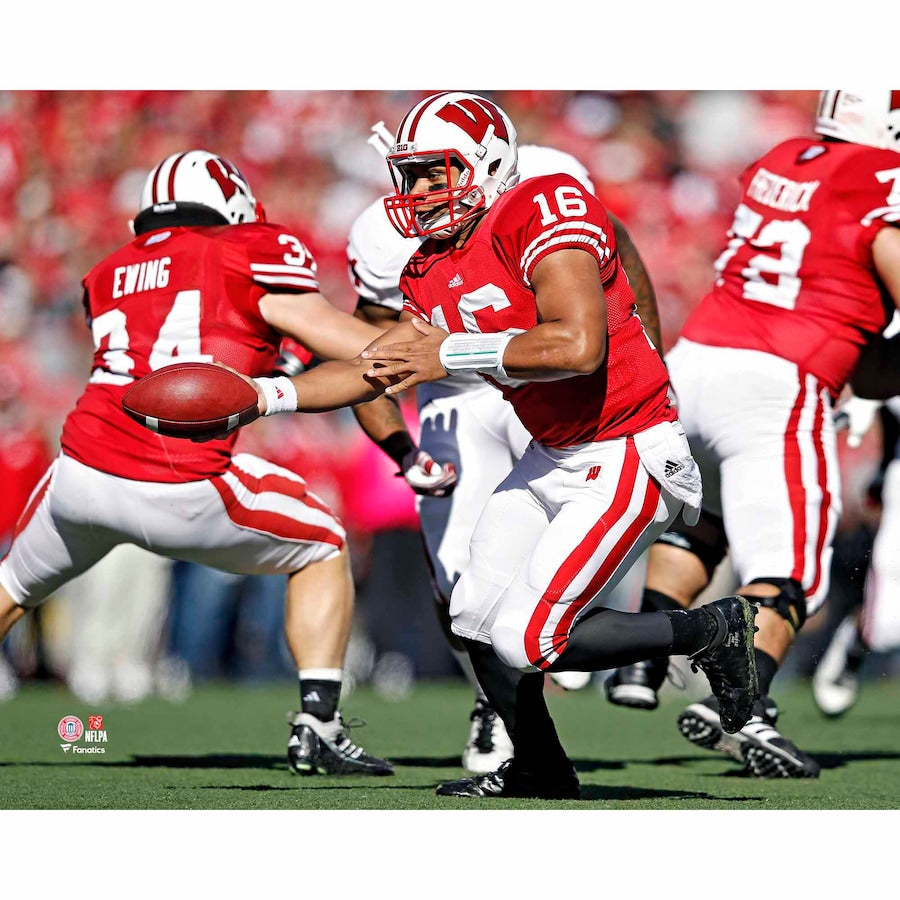 Russell Wilson Wisconsin Badgers Unsigned Red Jersey Hand Off Photograph